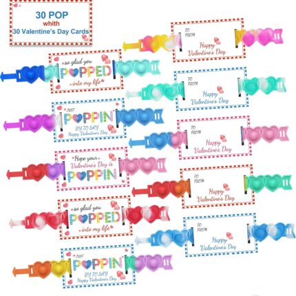 Colorful AYGXU heart-shaped pop fidget bracelets displayed with Valentine's Day cards for kids' exchanges.