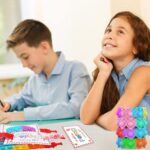 Colorful AYGXU heart-shaped pop fidget bracelets displayed with Valentine's Day cards for kids' exchanges.