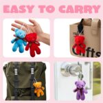 A collection of 28 mini plush bear toys in red, pink, and white, each paired with a unique Valentine's Day card.