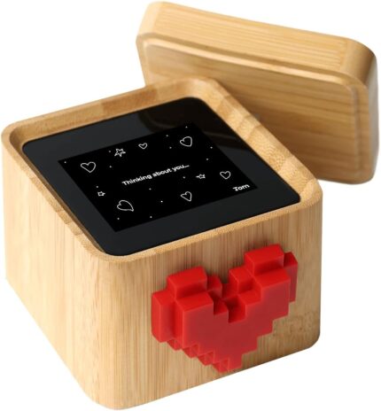 Lovebox Black & White Love Note Messenger with a red pixel heart spinning on the front, made of wood.