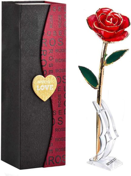 A single MNIEYU 24K gold dipped red rose standing upright on a clear display stand, inside an elegant gift box.