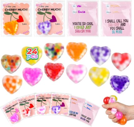 A pile of 24 small, colorful Valentines-themed squishy stress balls featuring various designs like hearts and cute characters