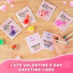 A pile of 24 small, colorful Valentines-themed squishy stress balls featuring various designs like hearts and cute characters
