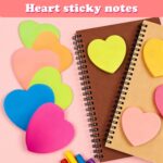 A stack of multicolor OHOME heart sticky notes, showcasing dark blue, light pink, neon green, orange, bright green, and hot p