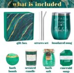 An emerald green spa gift basket featuring a bath bomb, body salt, candle, gem soap, and a stainless steel wine mug.