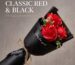 A vibrant red artificial rose bouquet featuring three realistic soap flower blooms with green faux silk leaves, arranged in a