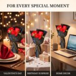 A vibrant red artificial rose bouquet featuring three realistic soap flower blooms with green faux silk leaves, arranged in a